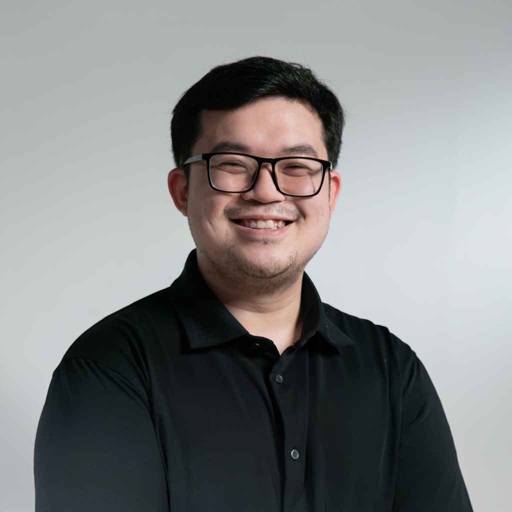 Portrait photo of director John Peter Cadiz Chua